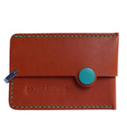 Brown Italian leather magnetic card holder with green button and titanium D-ring
ArtisLeather 