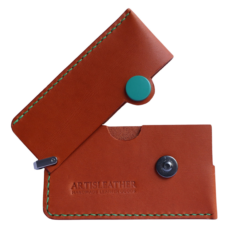 Brown Italian leather magnetic card holder with green button and titanium D-ring
ArtisLeather 