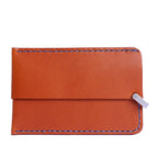 Brown Italian leather magnetic card holder with blue button and titanium D-ring
ArtisLeather 