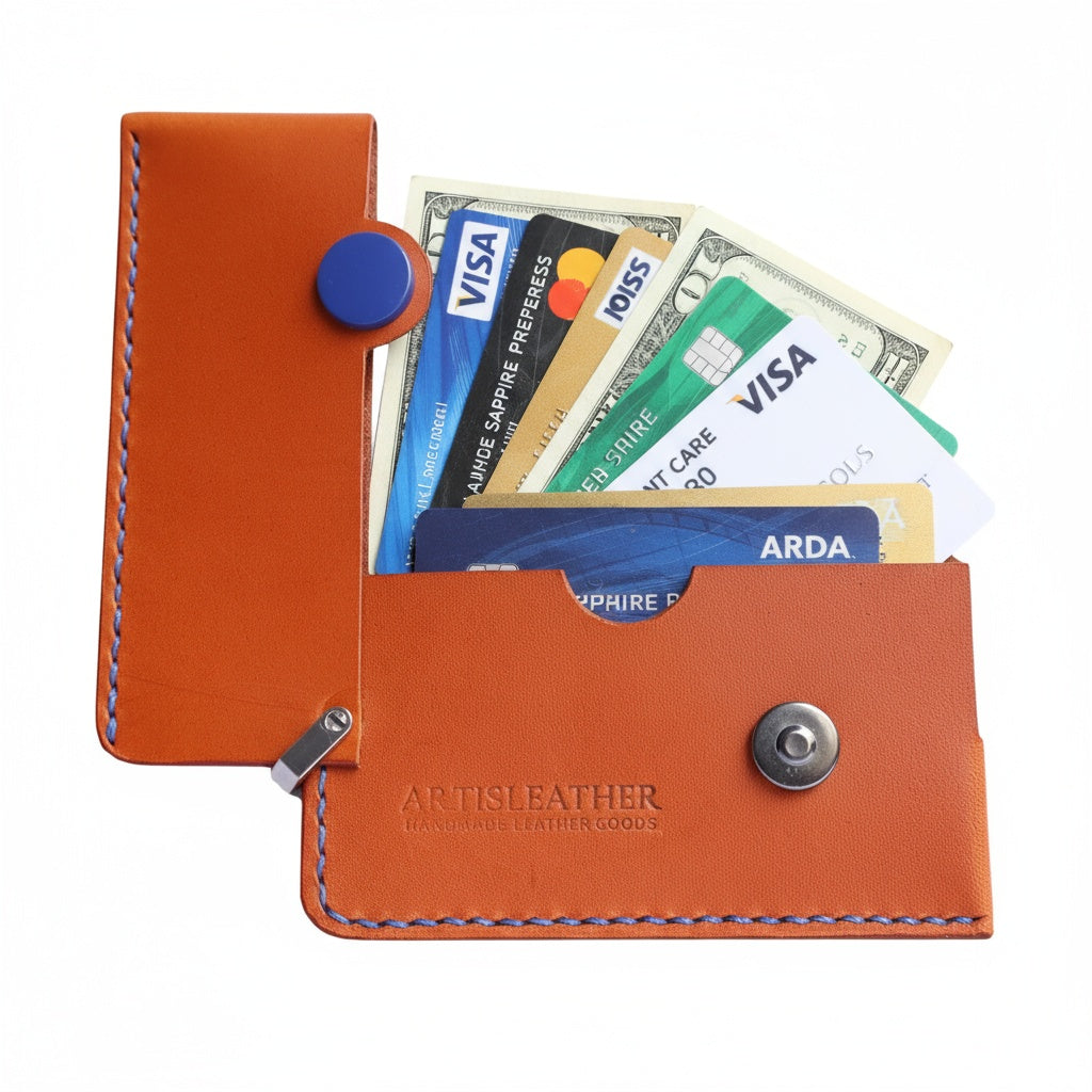 Brown Italian leather magnetic card holder with blue button and titanium D-ring
ArtisLeather 
