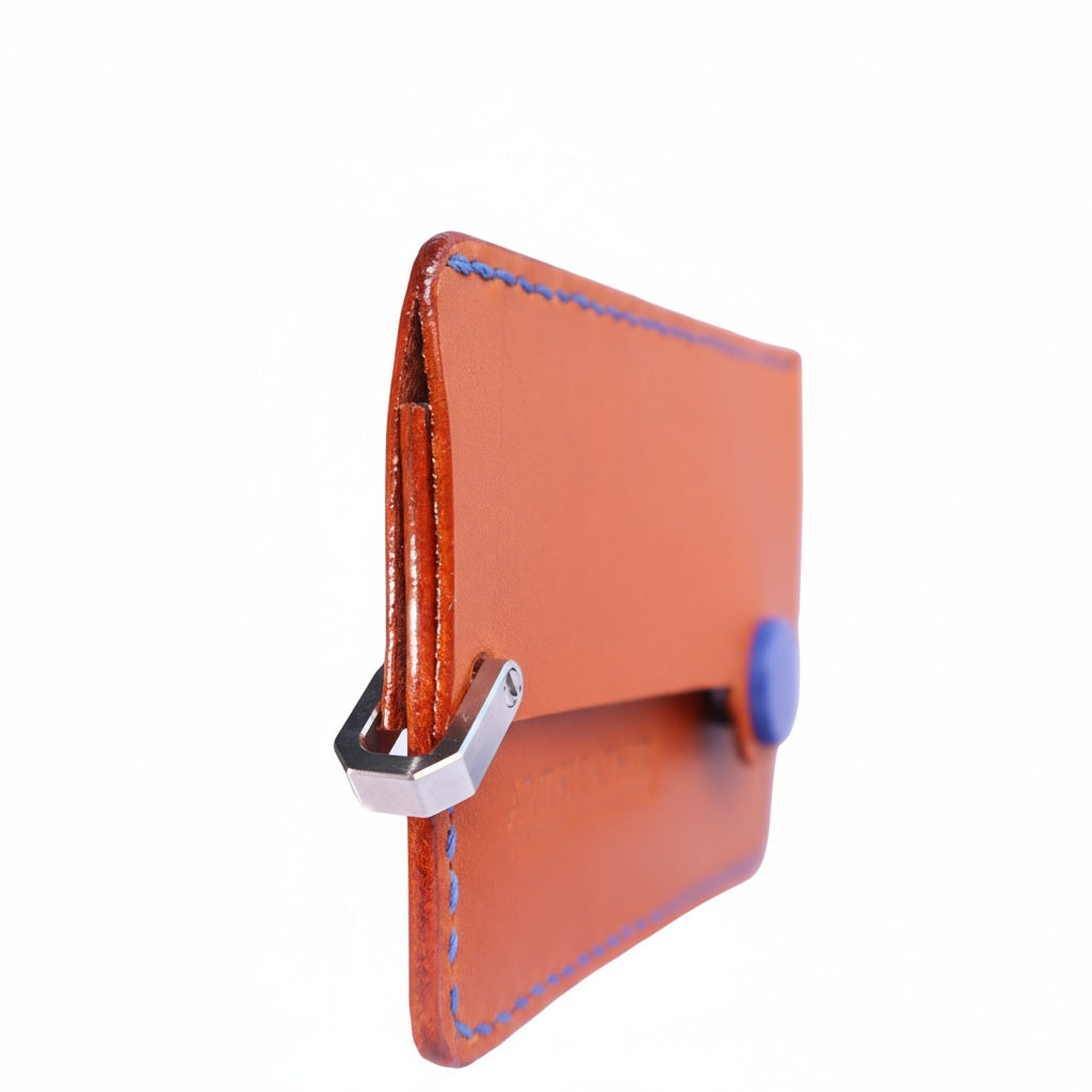 Brown Italian leather magnetic card holder with blue button and titanium D-ring
ArtisLeather 
