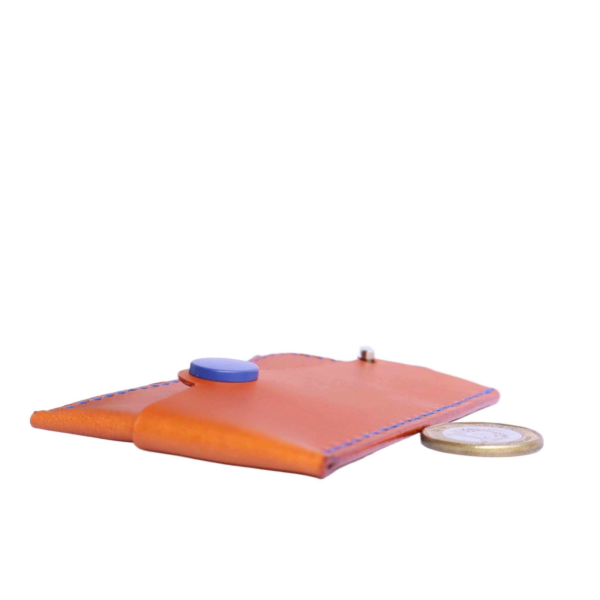 Brown Italian leather magnetic card holder with blue button and titanium D-ring
ArtisLeather 