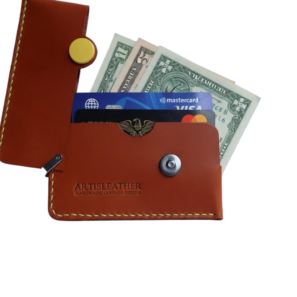 Brown Italian leather magnetic card holder with yellow button and titanium D-ring
ArtisLeather 