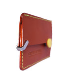 Brown Italian leather magnetic card holder with yellow button and titanium D-ring
ArtisLeather 